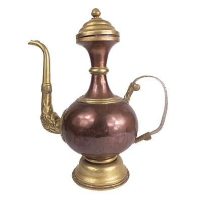 Lot 607 - A Tibetan copper and brass jug, 19th century.