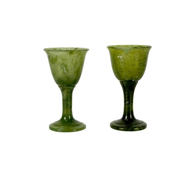 Lot 561 - Two Chinese jade goblets.