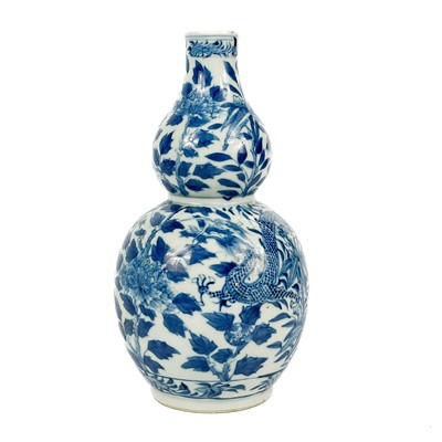 Lot 490 - A Chinese blue and white porcelain double gourd vase, late 19th century.