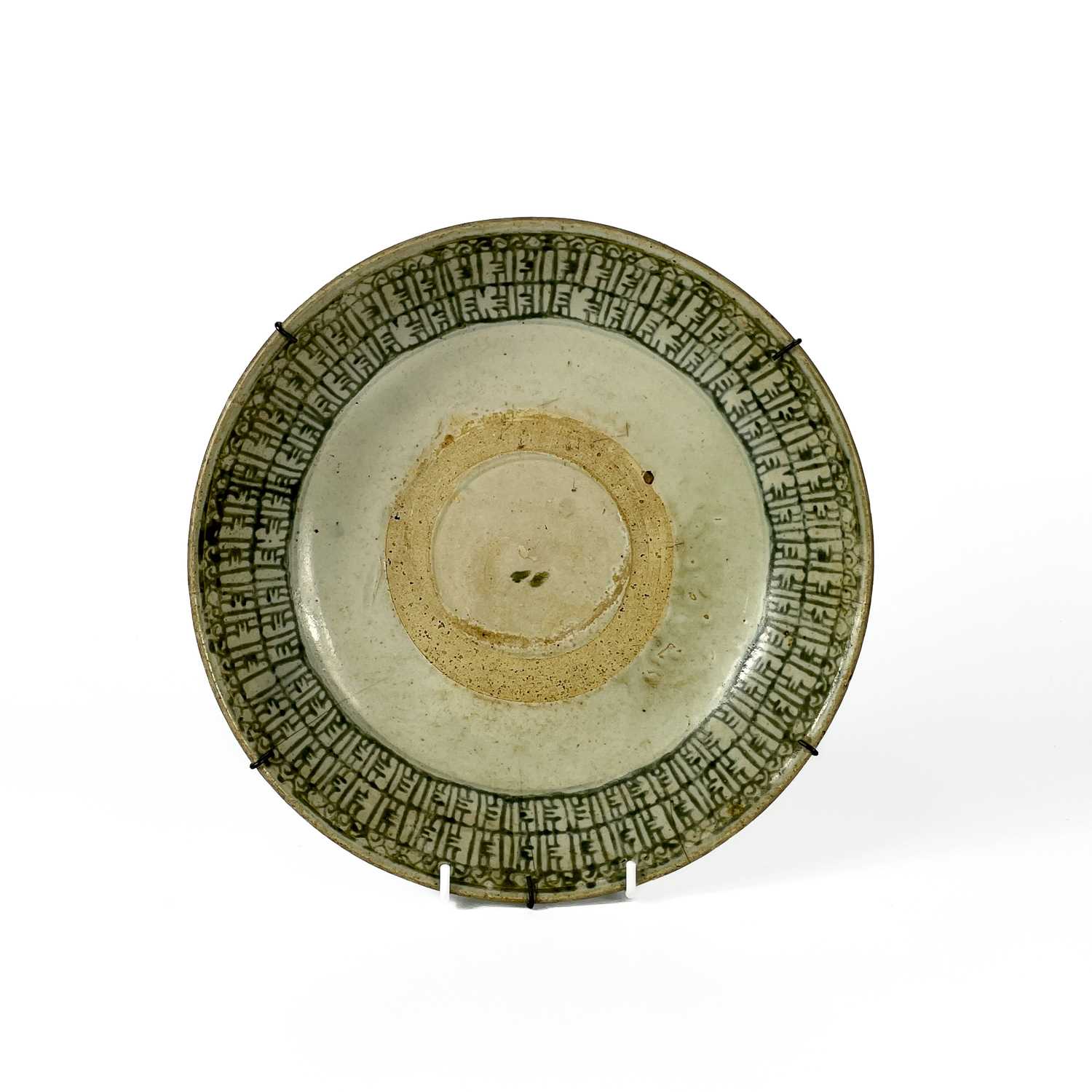 Lot 484 - A Chinese Ming provincial earthenware dish.