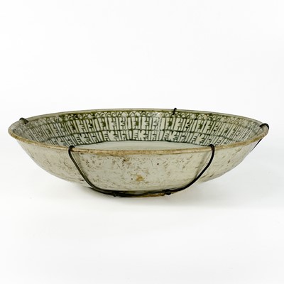 Lot 484 - A Chinese Ming provincial earthenware dish.