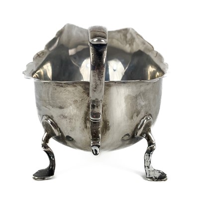 Lot 307 - A George V silver gravy boat by Martin Hall & Co Ltd.
