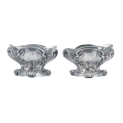 Lot 213 - A pair of Edwardian silver Art Nouveau design salts by C E Williams.