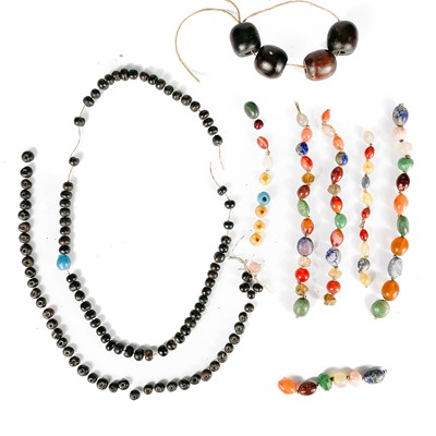 Lot 479 - A possibly Tibetan hardstone, nut  and glass bead necklace.