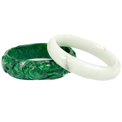 Lot 485 - Two Chinese jade bangles.