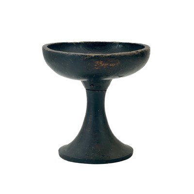 Lot 122 - An African tribal stem footed bowl.