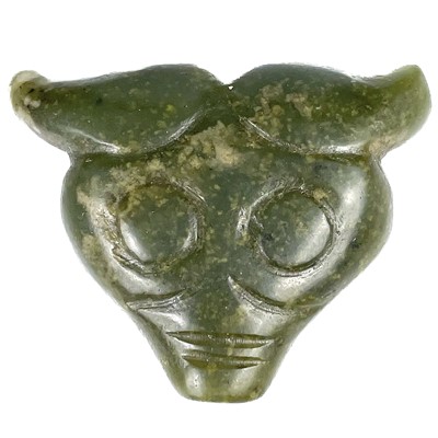 Lot 495 - A Chinese green jadeite buffalo head pendant.