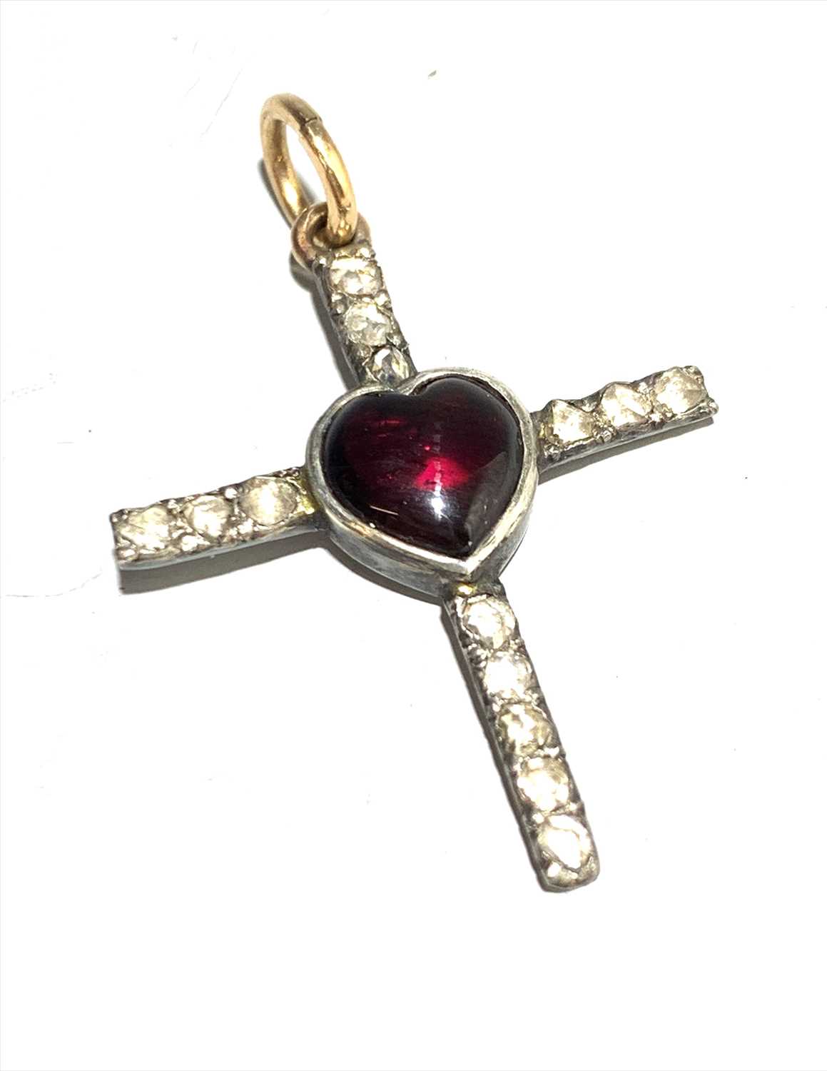 Lot 2454 - A garnet cross.