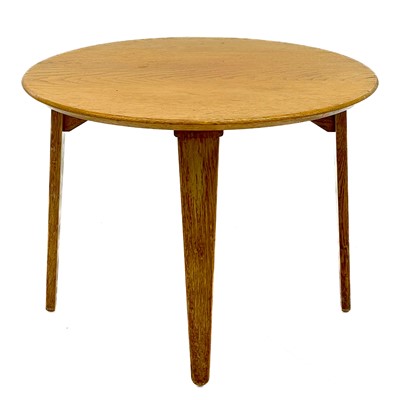 Lot 447 - Gordon Russell golden oak circular coffee table.