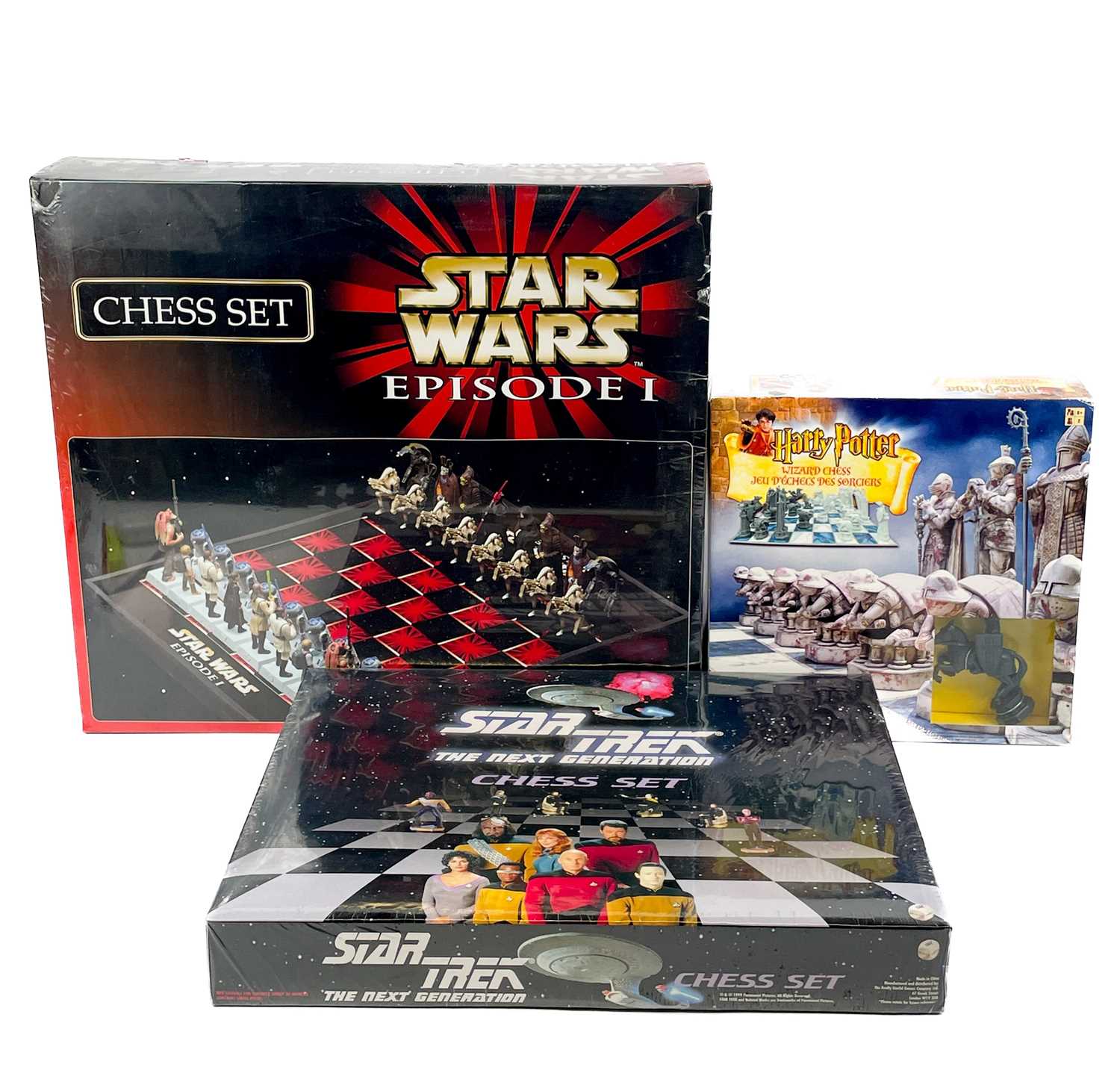 Lot 717 - Star Wars, Star Trek, Harry Potter themed mint boxed chess sets (x3)