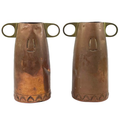 Lot 131 - A pair of WMF copper and brass vases.