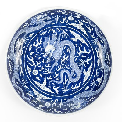 Lot 630 - A Chinese blue and white porcelain  dragon dish, Daoguang mark.