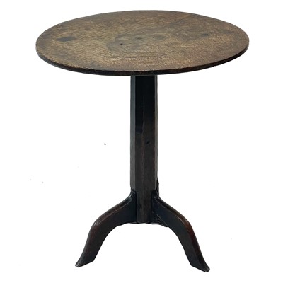 Lot 257 - A late Georgian primitive oak circular occasional table.