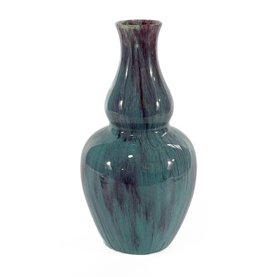 Lot 641 - A Chinese flambe double gourd vase.