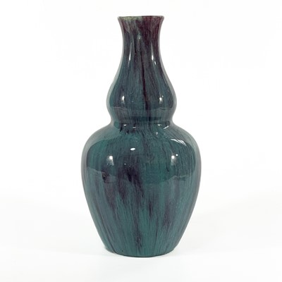 Lot 641 - A Chinese flambe double gourd vase.