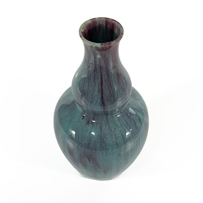 Lot 641 - A Chinese flambe double gourd vase.