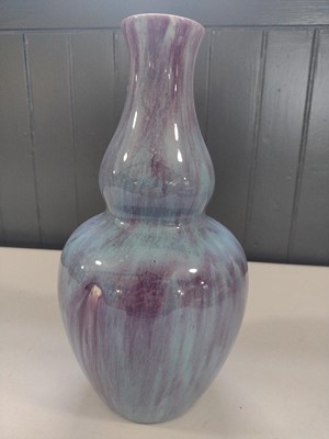 Lot 641 - A Chinese flambe double gourd vase.