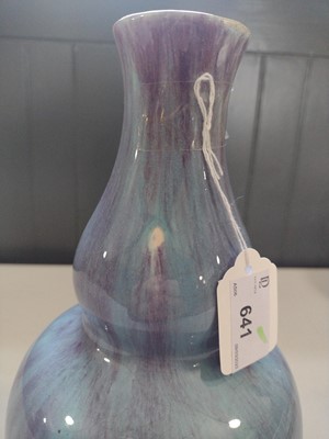 Lot 641 - A Chinese flambe double gourd vase.