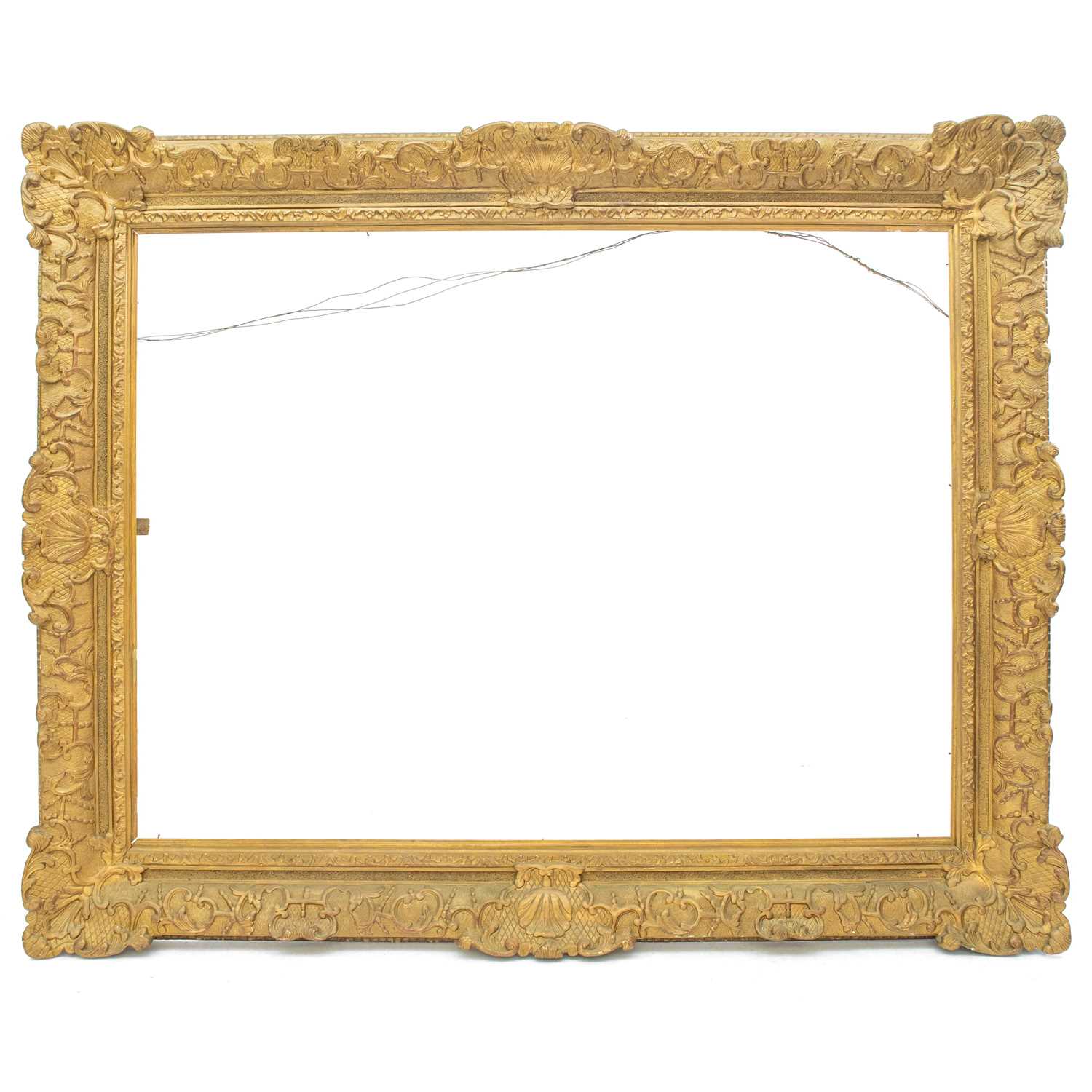 Lot 242 A large gesso gilt picture frame.