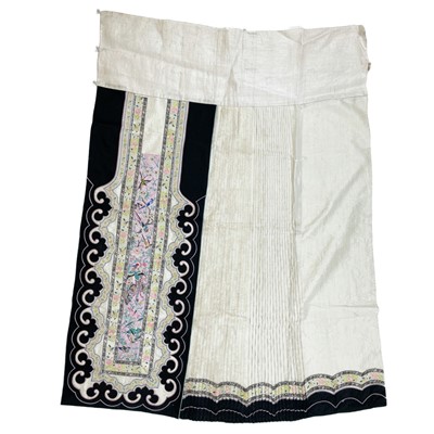 Lot 698 - A Chinese silk embroidered skirt, 19th century.