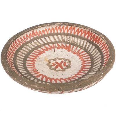 Lot 110 - A Middle Eastern painted pottery dish, 19th century.