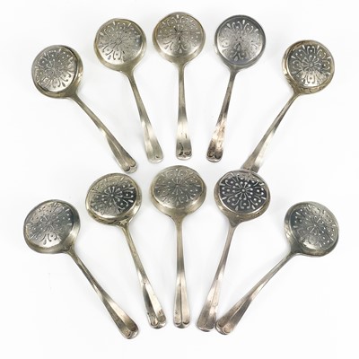 Lot 193 - A set of ten George VI silver Hanoverian pattern sifter spoons by Harry Atkin.