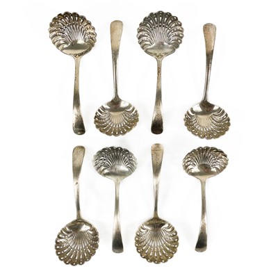 Lot 281 - A George VI silver set of eight sifter spoons by Harry Atkin.