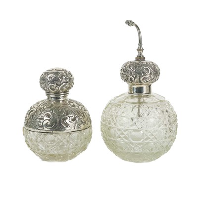 Lot 143 - An Edwardian silver mounted cut glass ovoid scent bottle by J H Worrall, Son & Co Ltd.