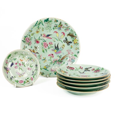 Lot 647 - Seven Chinese celadon famille rose plates, 19th century.