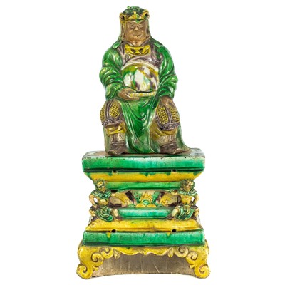 Lot 466 - A Chinese figure of a God of War, with associated stand, Ming Dynasty.