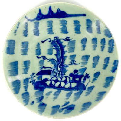 Lot 659 - A Chinese celadon blue decorated dish, 19th century.