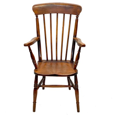 Lot 246 - A Victorian beech, ash and elm kitchen Windsor armchair.