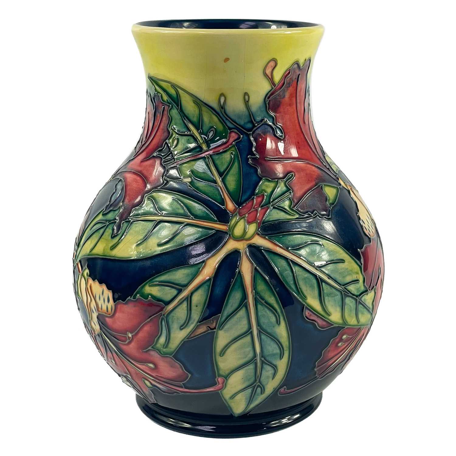 Lot 832 - A Moorcroft Simeon pattern vase.