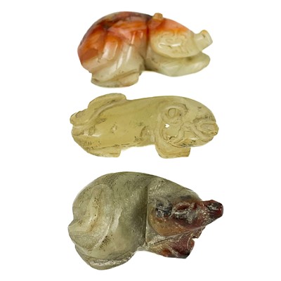 Lot 17 - Three Chinese caved jade animal figures.