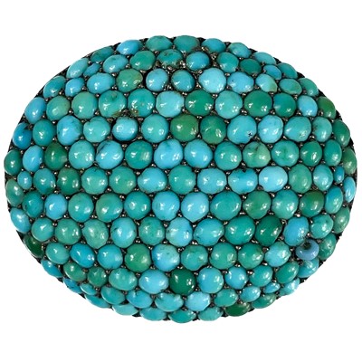 Lot 25 - A Victorian high carat gold (tests 14ct) turquoise  pavé set oval brooch.