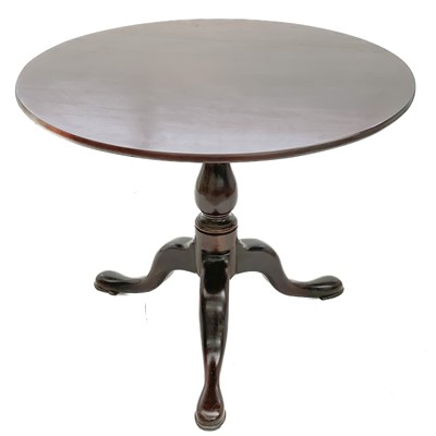 Lot 1873 - A George III mahogany circular tripod table.