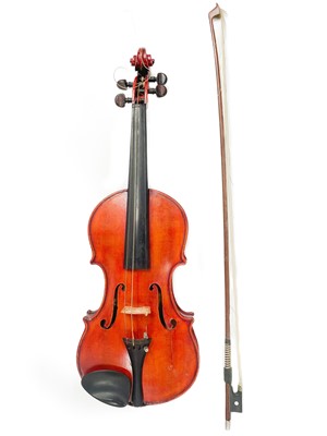 Lot 118 - Two cased violins with bows.