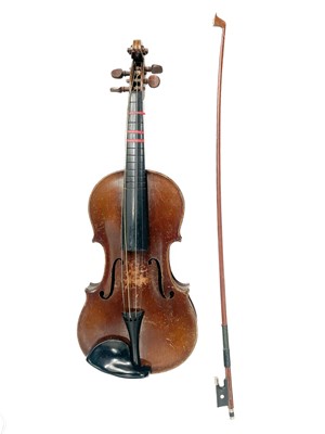 Lot 118 - Two cased violins with bows.