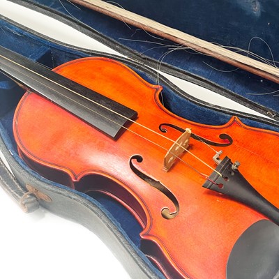 Lot 118 - Two cased violins with bows.