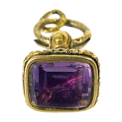 Lot 62 - A Victorian pinchbeck amethyst set fob seal.