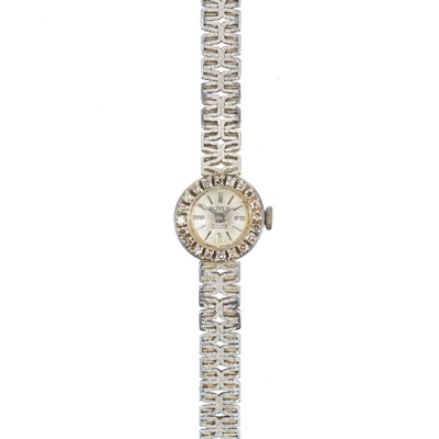 Lot 88 - An 18ct white gold and diamond set lady's manual wind cocktail wristwatch.