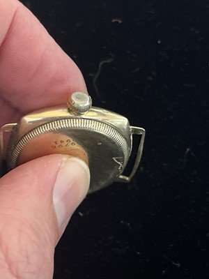Lot 105 - ROLEX OYSTER - A 1930's 9ct gold cushion cased gentleman's manual wind wristwatch.
