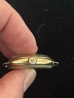 Lot 105 - ROLEX OYSTER - A 1930's 9ct gold cushion cased gentleman's manual wind wristwatch.