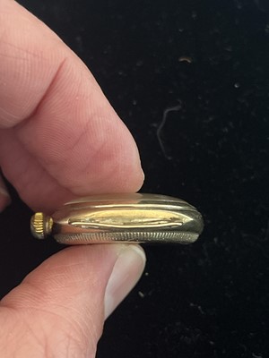 Lot 105 - ROLEX OYSTER - A 1930's 9ct gold cushion cased gentleman's manual wind wristwatch.