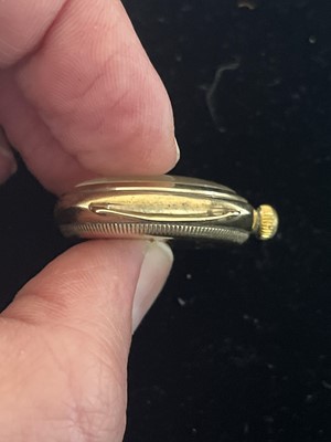 Lot 105 - ROLEX OYSTER - A 1930's 9ct gold cushion cased gentleman's manual wind wristwatch.