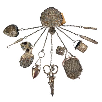 Lot 441 - A 19th century Indian silver chatelaine clip applied with Victorian and later attachments.