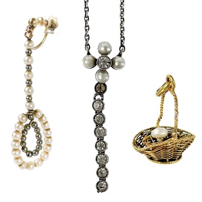 Lot 41 - An 18ct gold wire work pearl set egg basket charm.