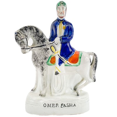 Lot 251 - A Victorian Staffordshire equestrian figure of Omer Pasha.