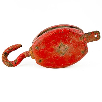 Lot 52 - A red painted ship's block and hook.