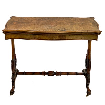 Lot 1836 - A Victorian burr walnut fold-top card table.